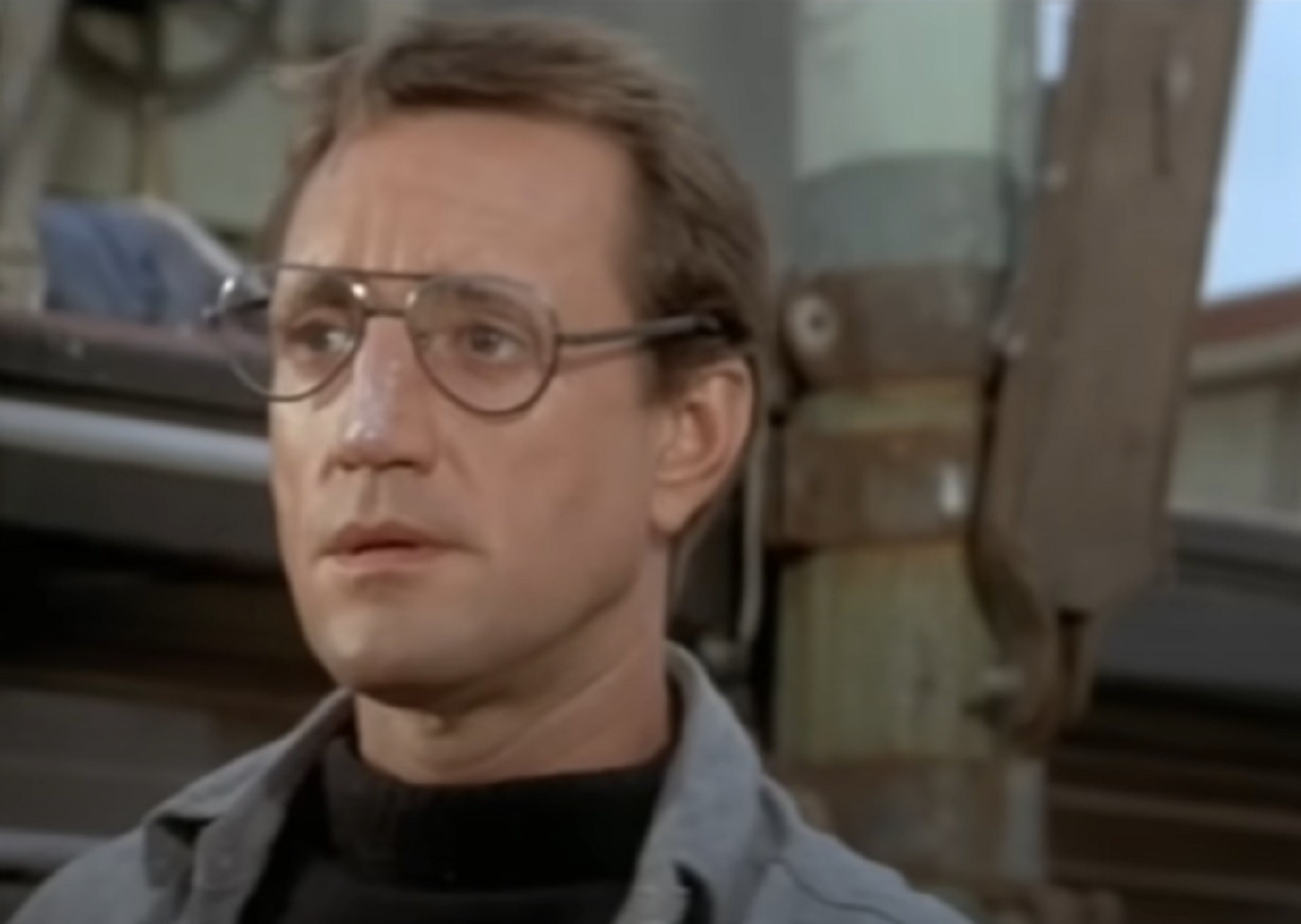 Screenshot of Carrie-Anne Moss looking upset - from The Matrix (1999)