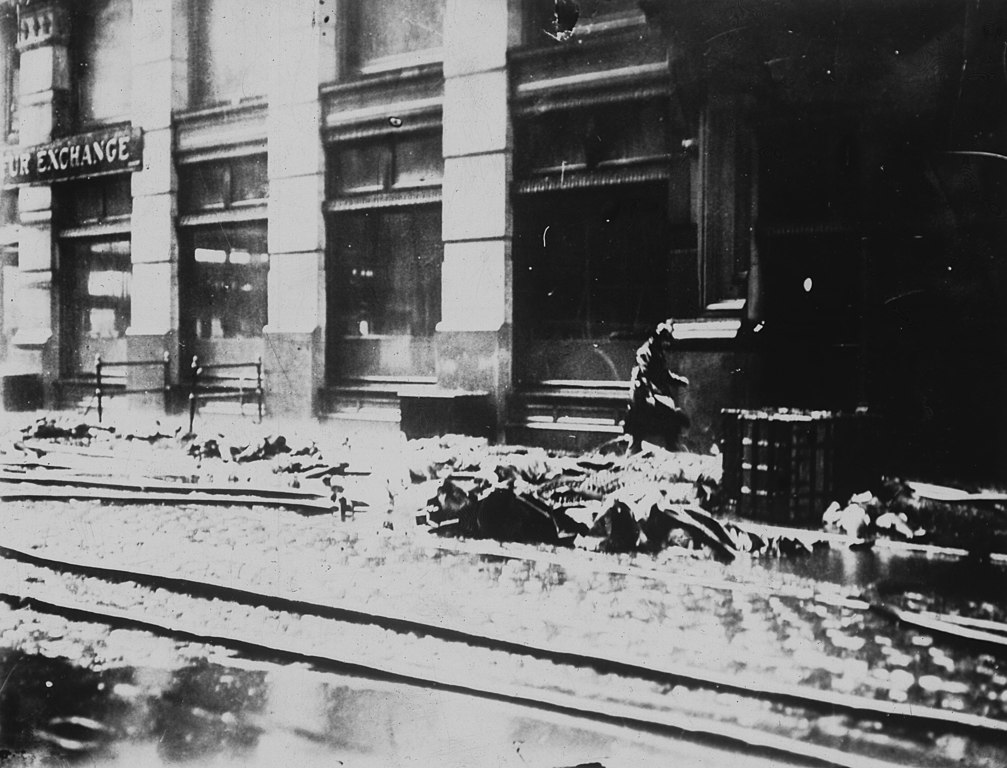 Negative print showing the street in front of the Asch Building, where the Triangle Waist Company fire burned