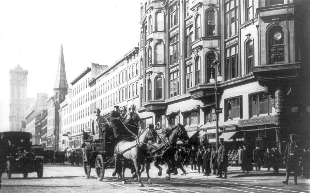 Horse-drawn fire engines in street, on their way to the Triangle Shirtwaist Company fire, New York City