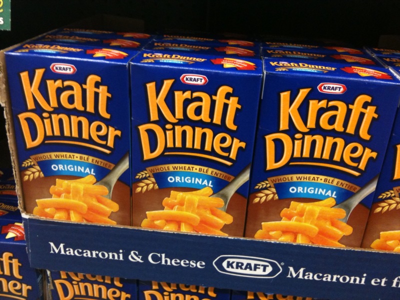 Close-up Photo of Kraft Dinner Macaroni & Cheese placed on a market rack
