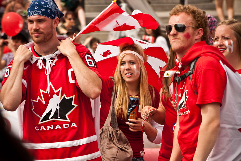 Pictures of people enjoying the Canada Day celebrations wearing Canadian jerseys