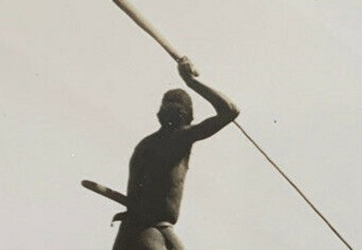 Aborigine hunting with woomera in Central Australia - 1930s