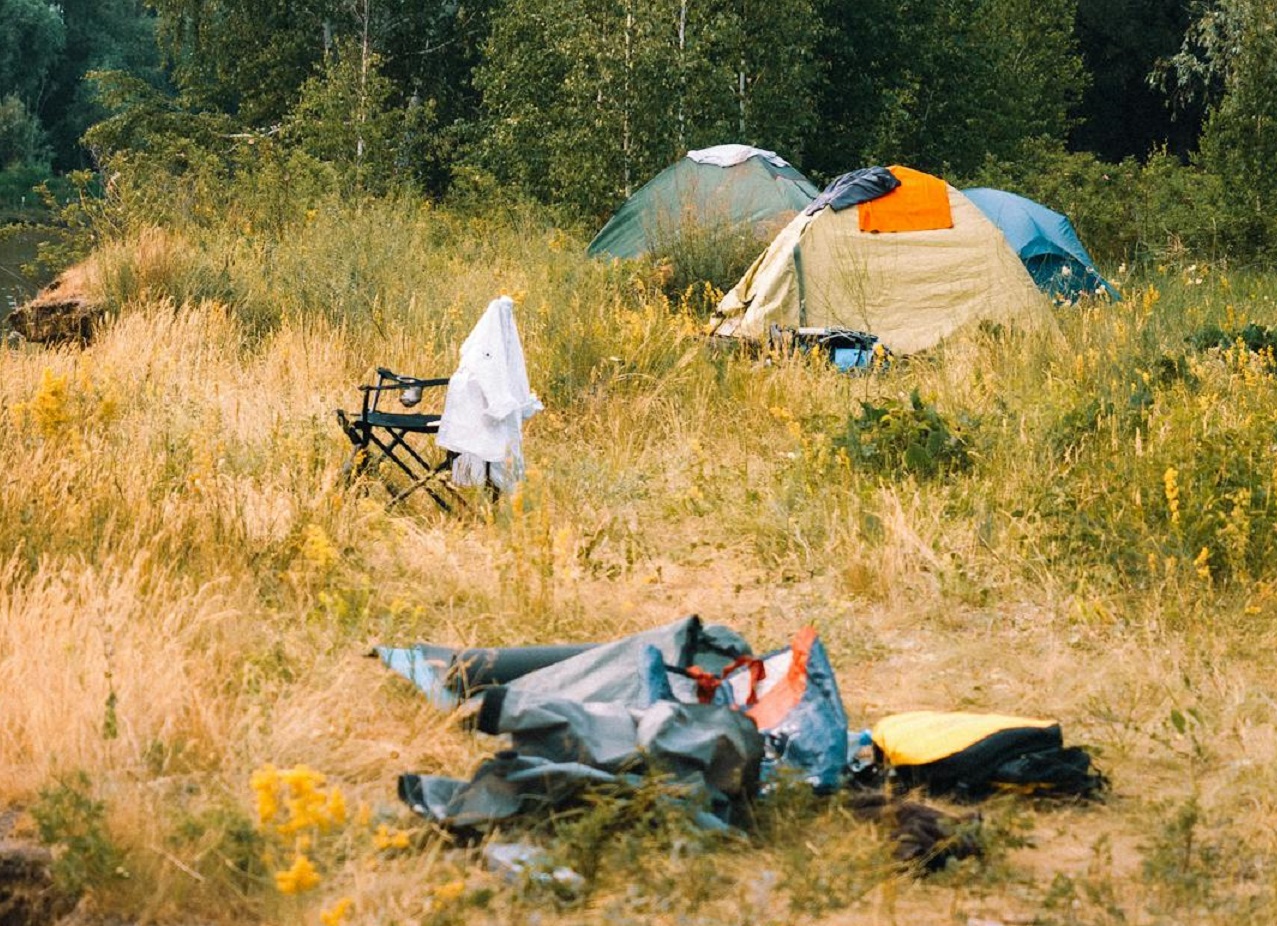 Tents and a Chair in a Camp