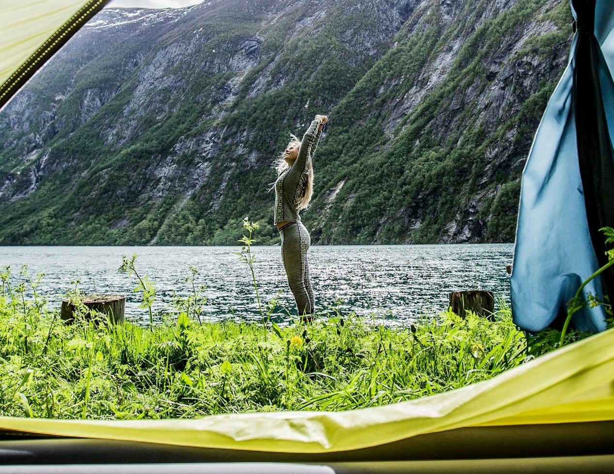 Woman Stretching Beside Sea