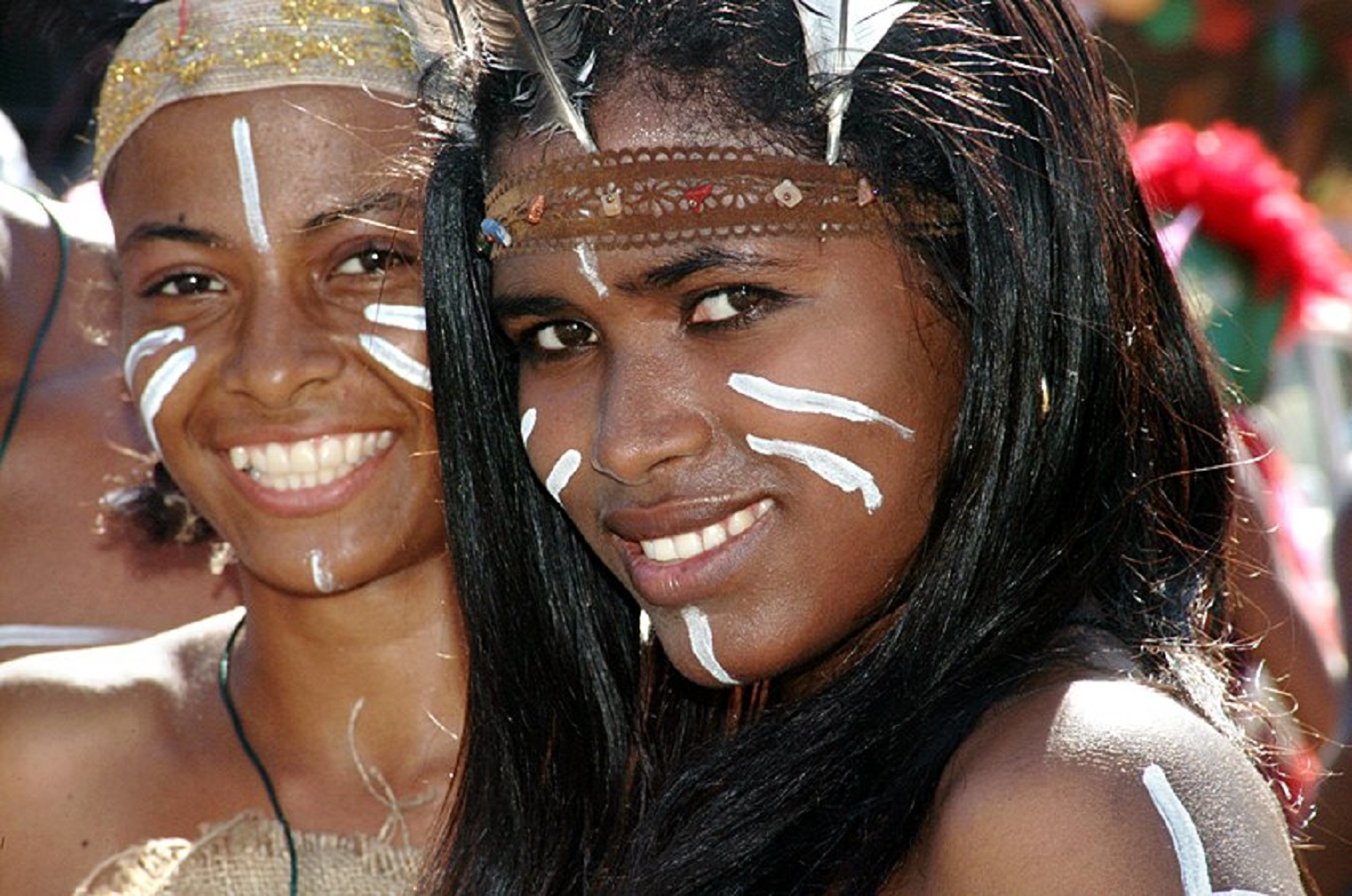 Taíno girls at the Dominican carnival in garments and makeup.
