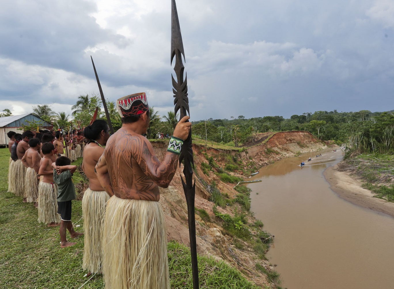 Taino Indigenous people next to a river.