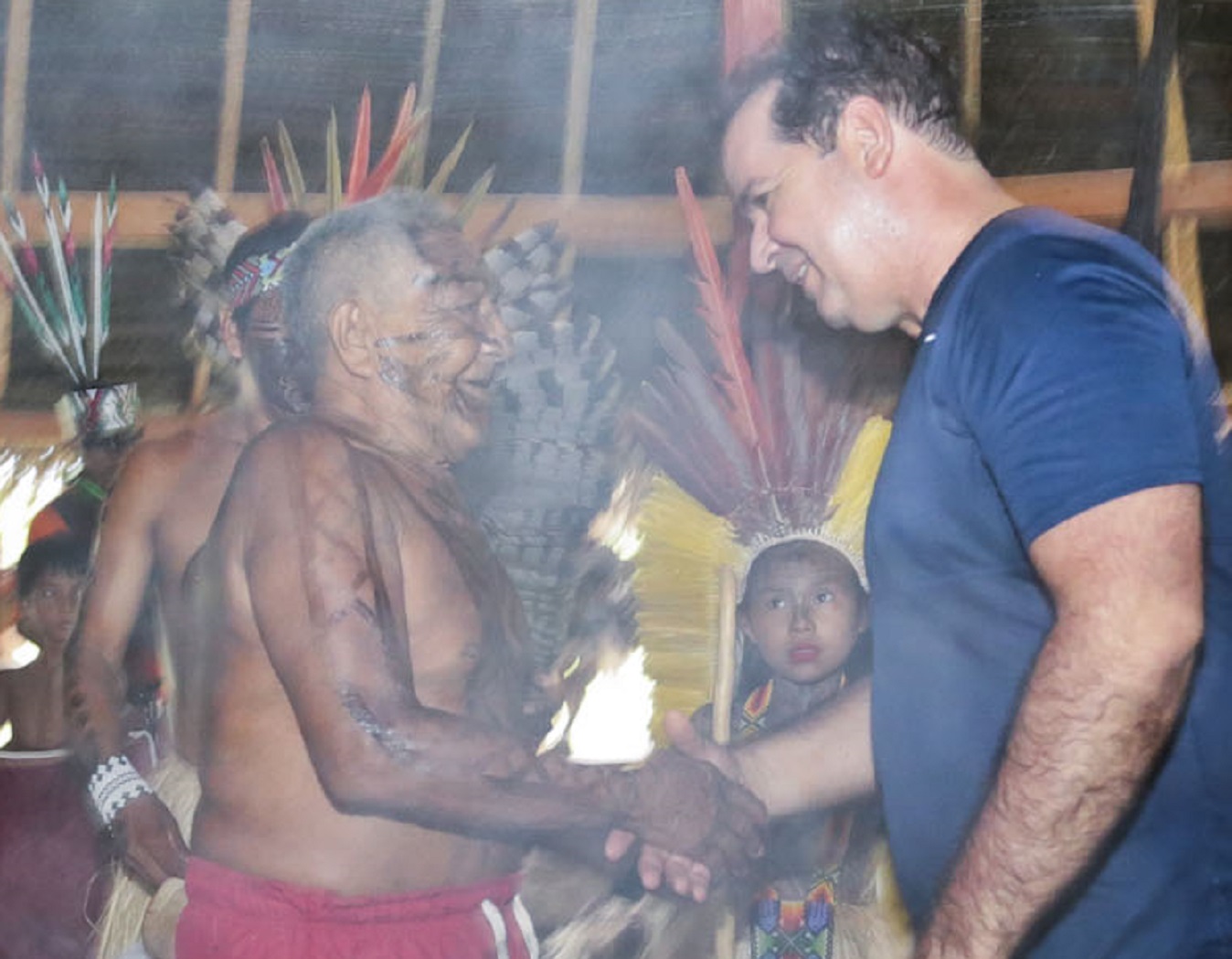 Taino Indigenous people talking with other people.