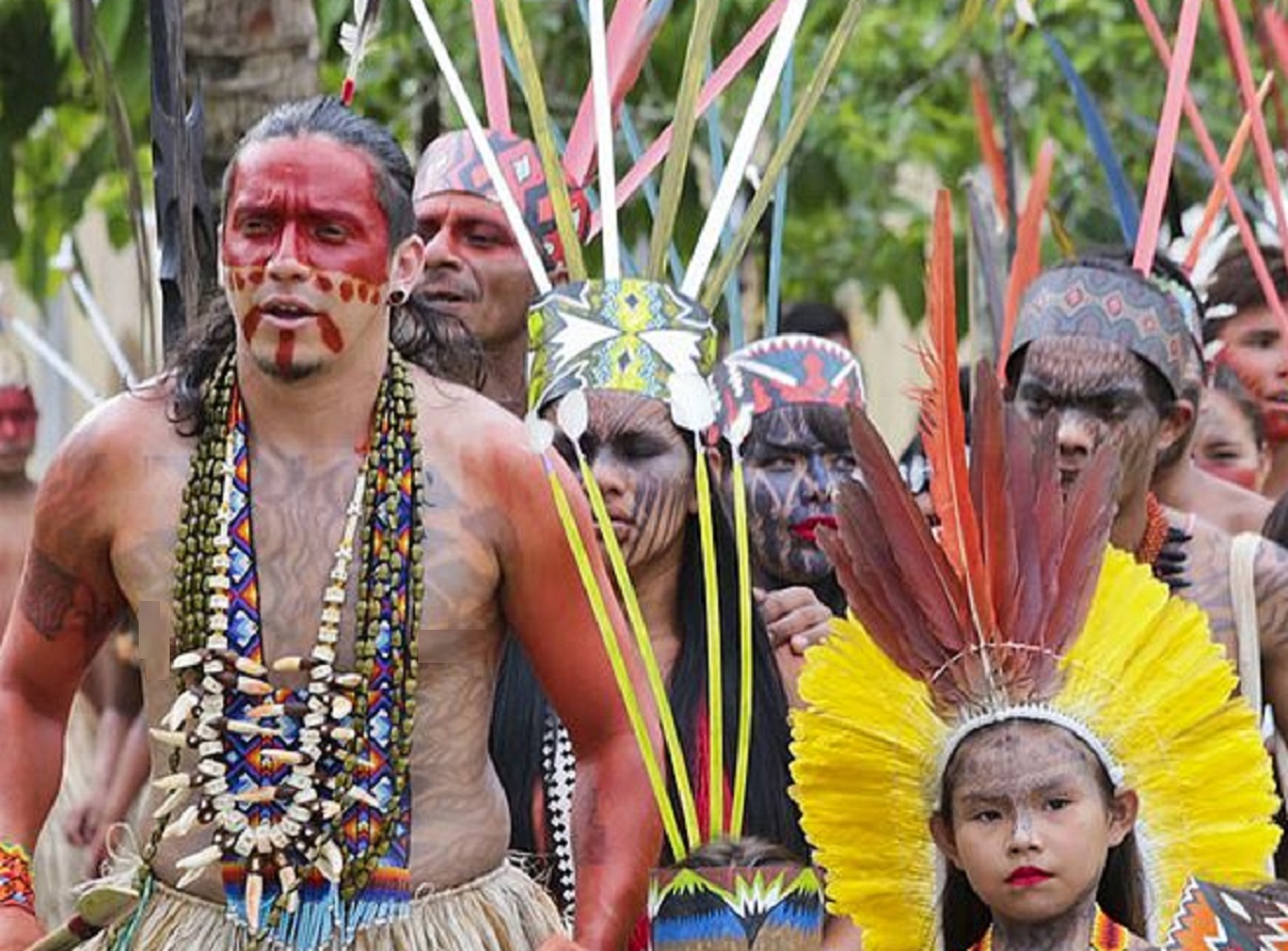 Taino Indigenous people outside.