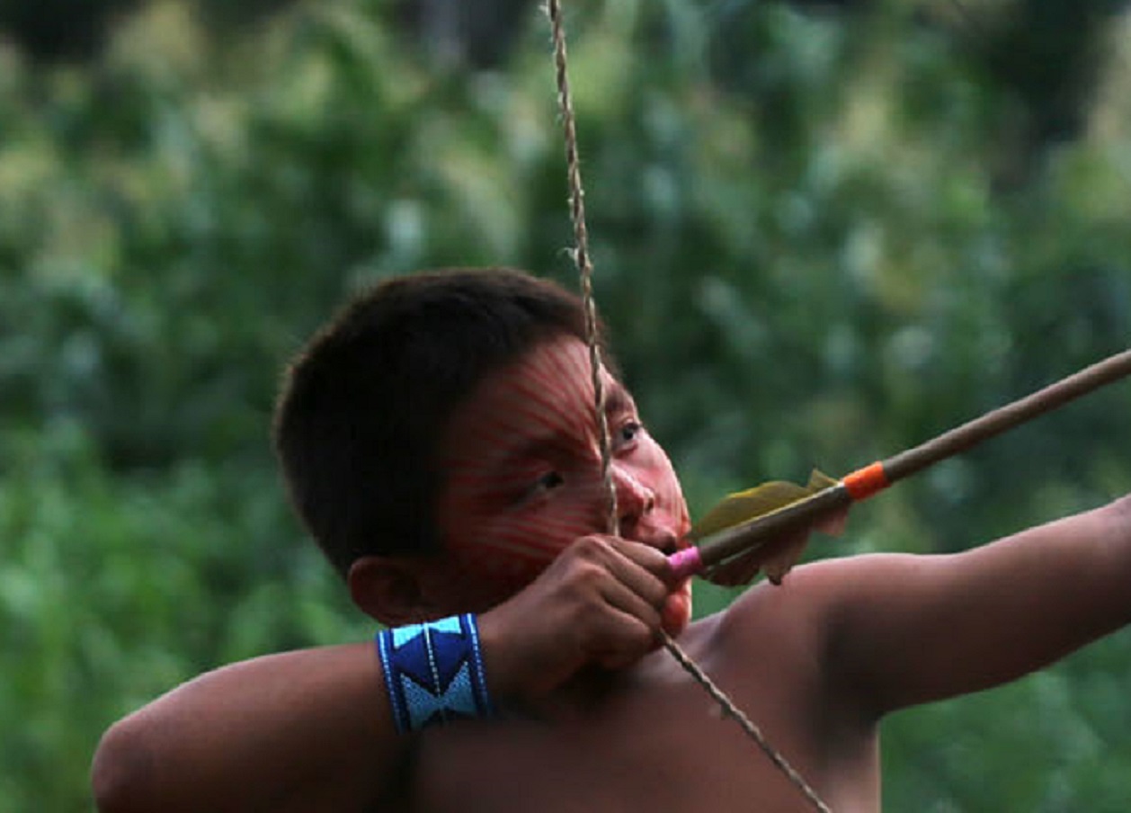Taino kid with arrow.