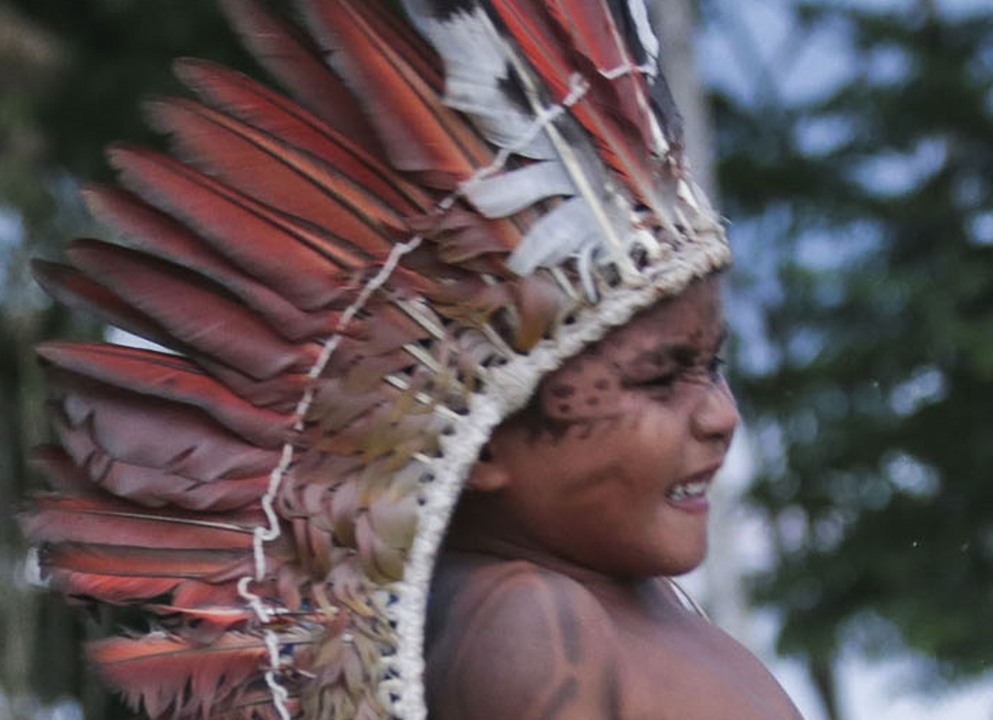 Taino Indian kid smiling.
