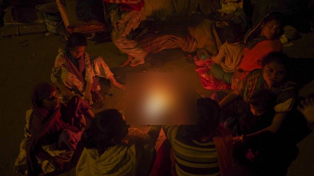 People in India around fire