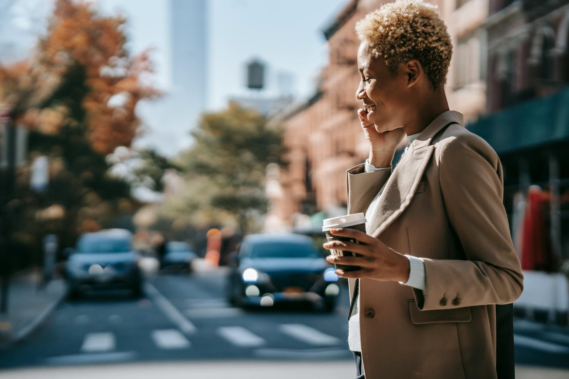 Woman holding a coffee