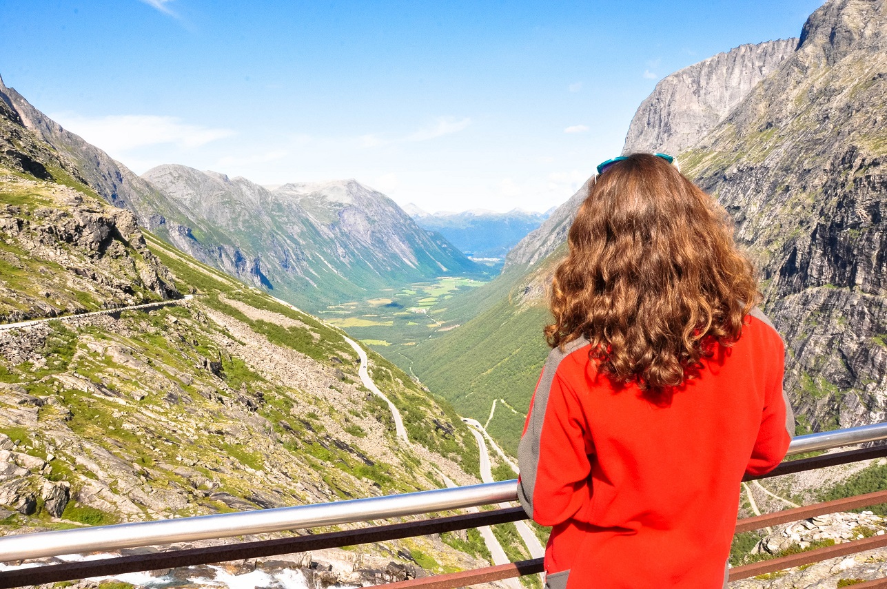 Girl looks at Troll Road, Norway