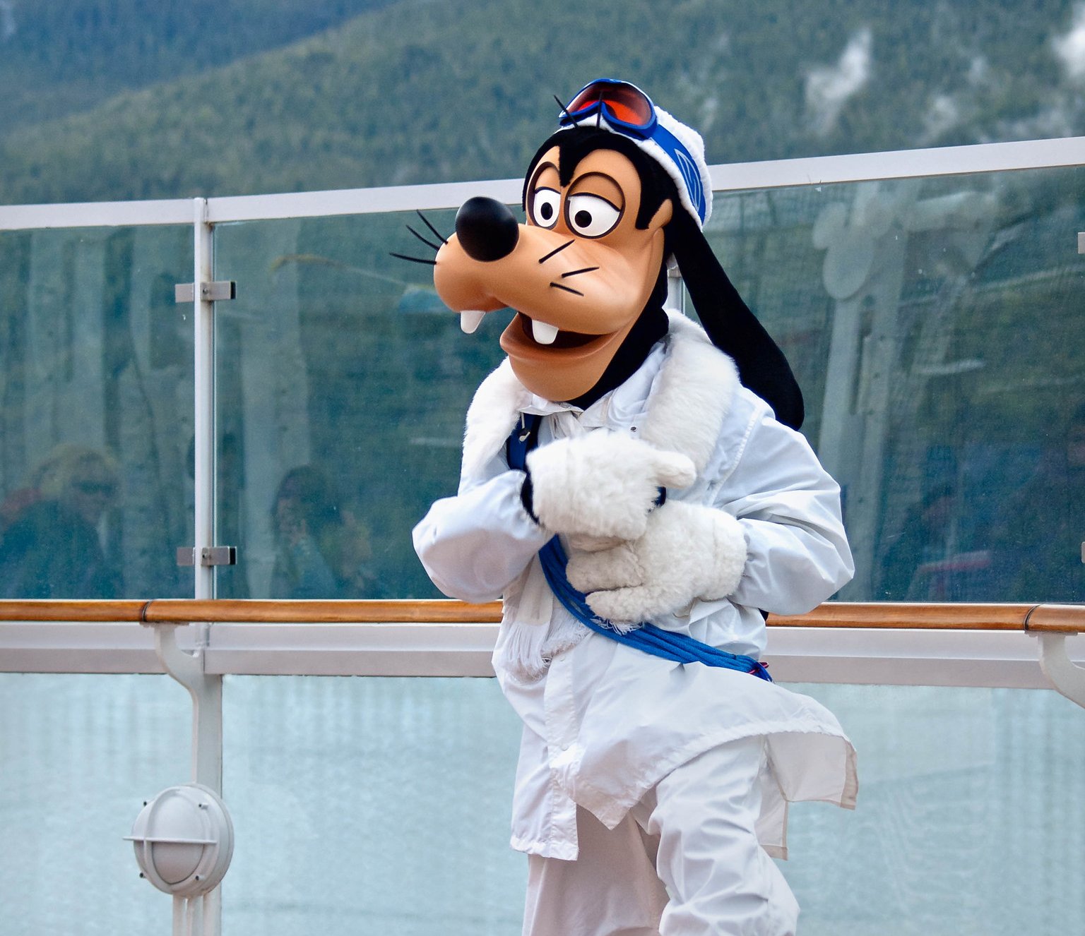 Goofy in Snow Gear entertains guests on the deck of the Disney Wonder