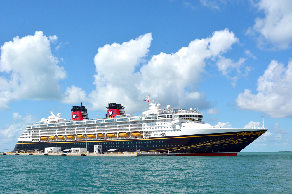 Disney Cruise Line ship, docks in Key West, Fl. Cloudy sky in the background.