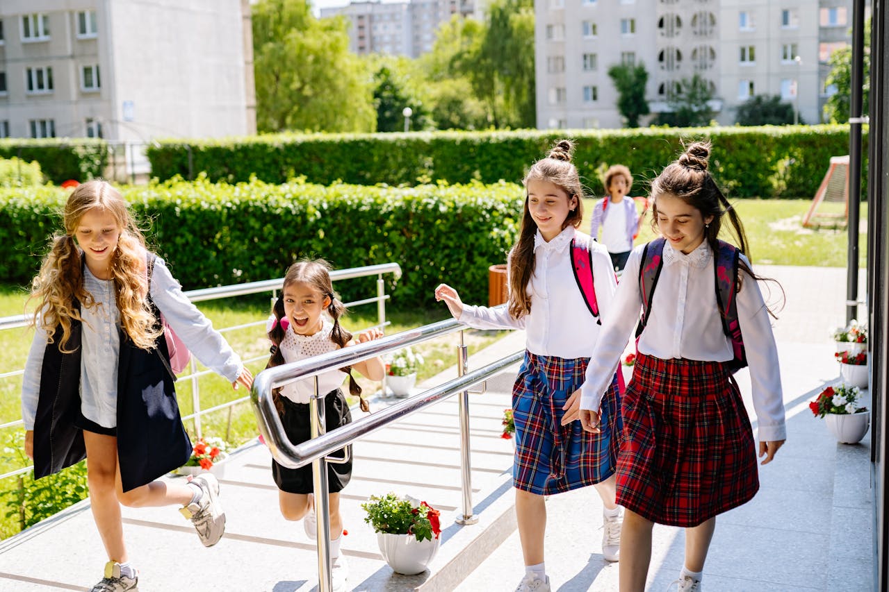 Kids with backpacks going to school