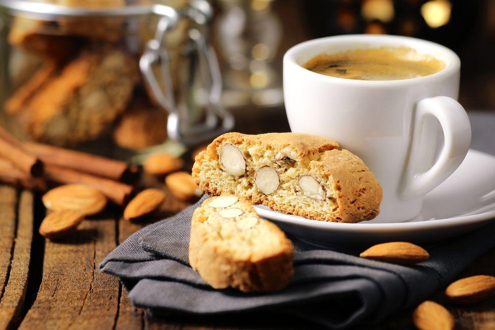 coffee and biscuits on a wooden table