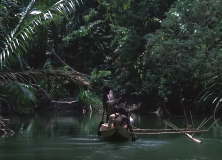 Onge tribe men on a boat