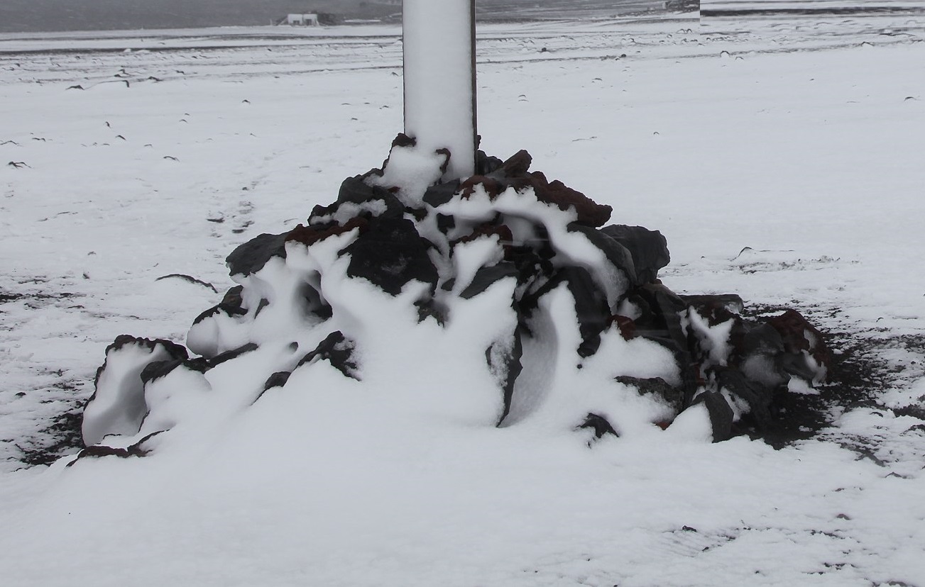 Grave Of A Norwegian Carpenter in snow.