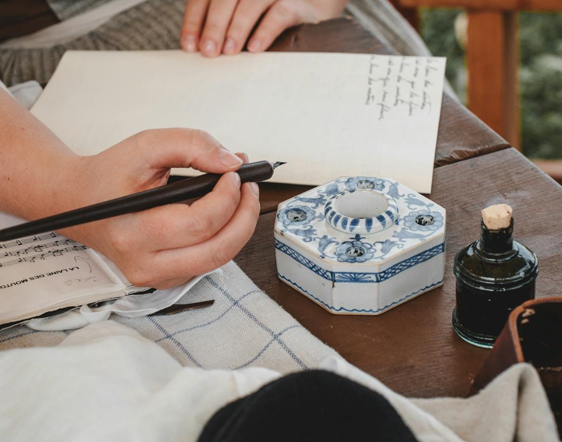 Woman Writing Letter on Table