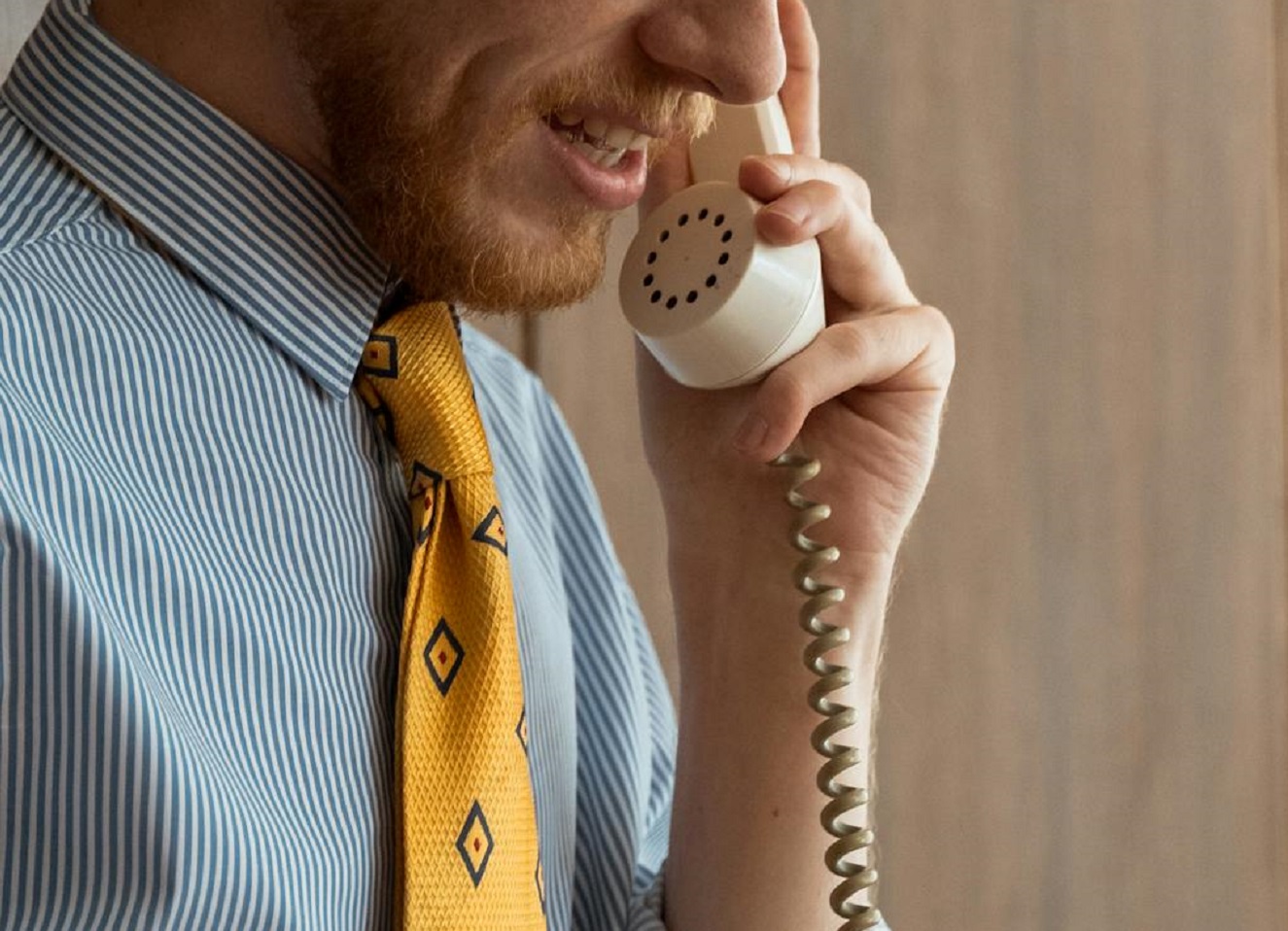 A Bearded Man on a Phone Call