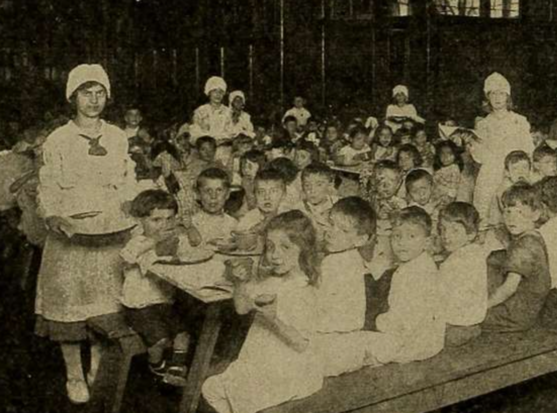 Children at school with teacher - 1920