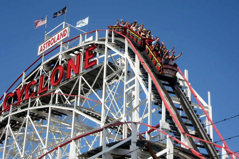 image of people riding on The Cyclone Roller Coaster