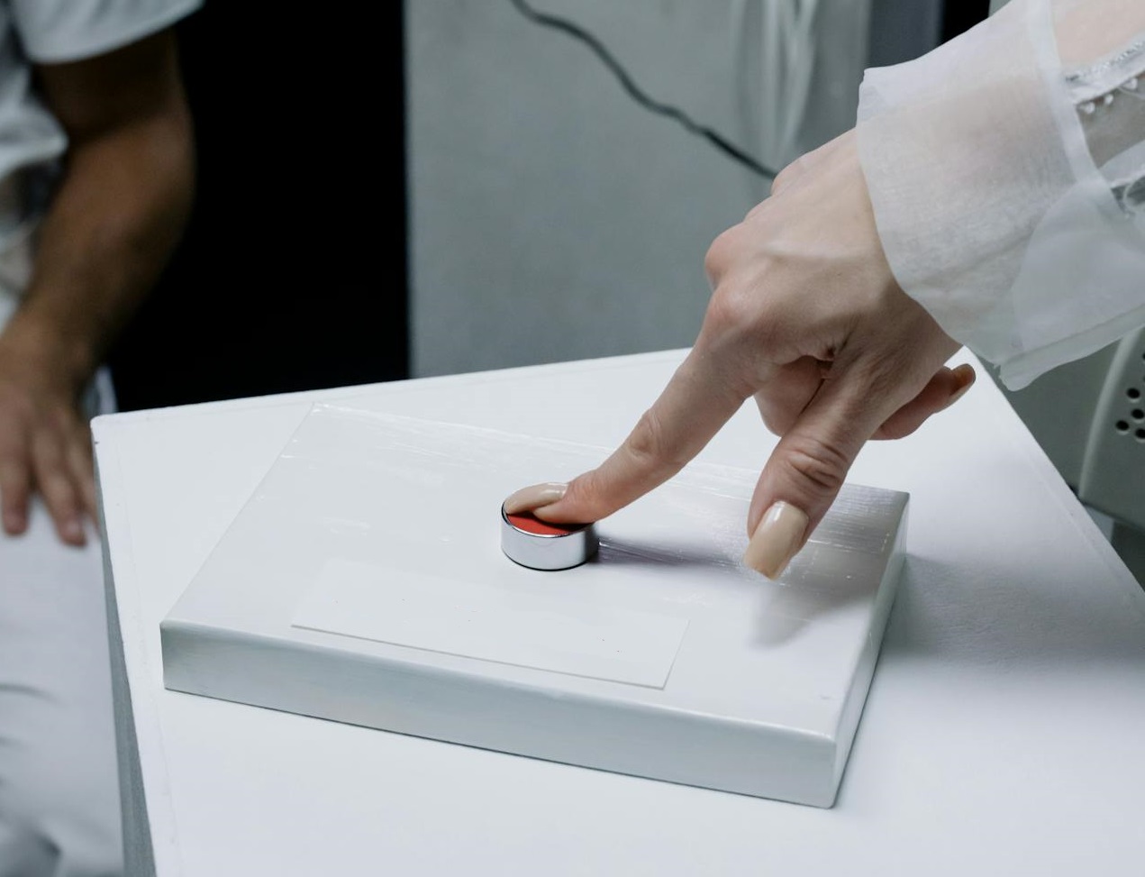 Person Pressing a Button