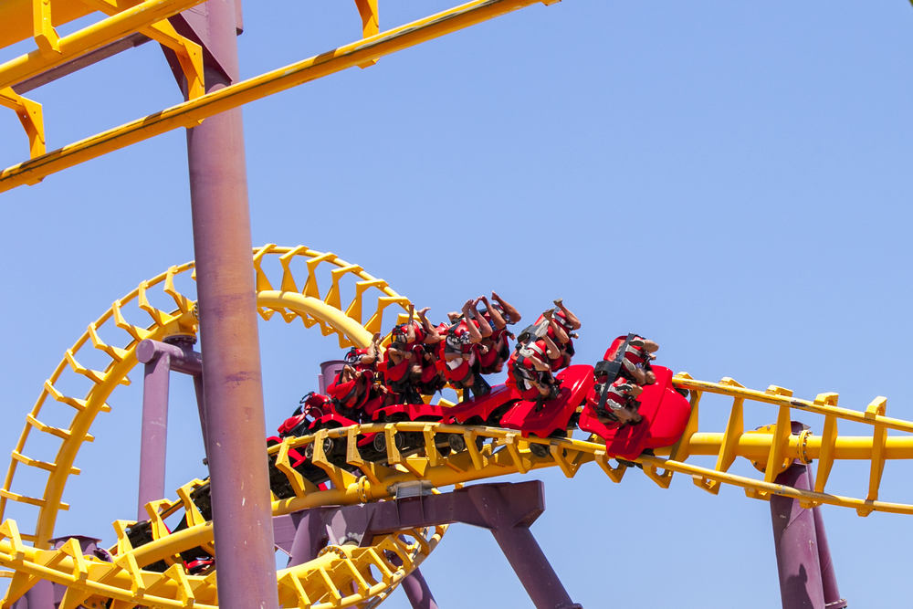 yellow Roller coaster with people