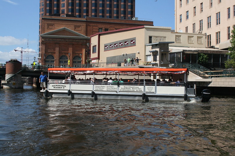 The Milwaukee Maiden II party boat floating down the Milwaukee River