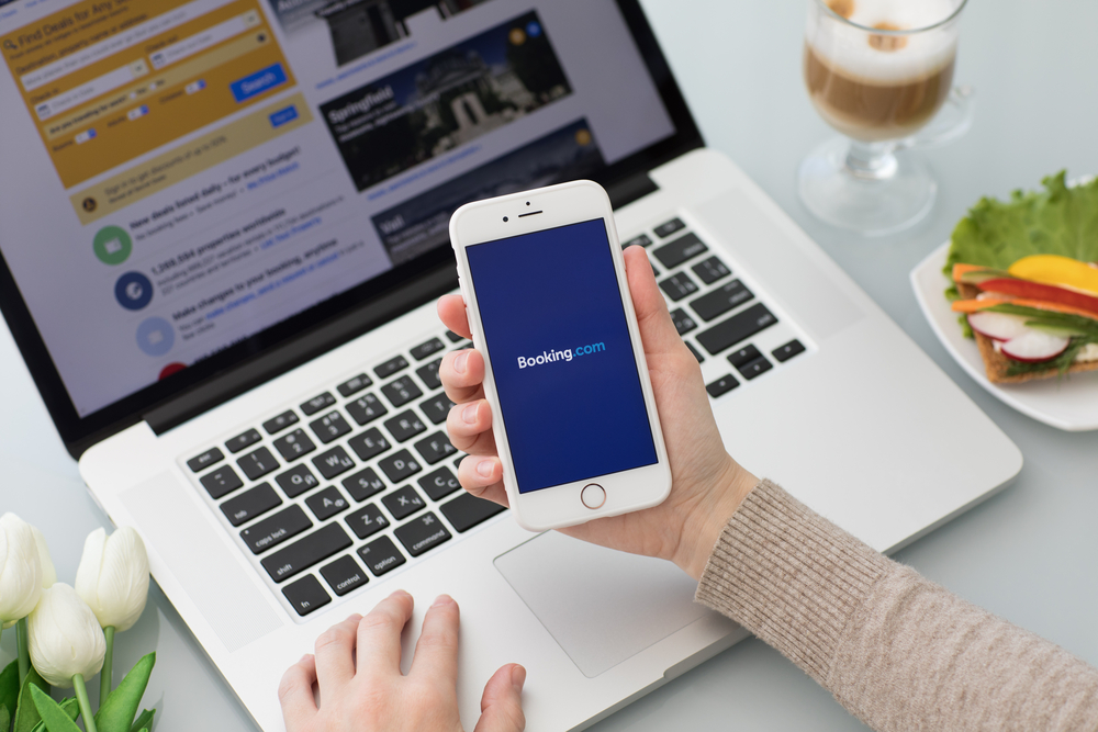 Woman making a hotel reservation online