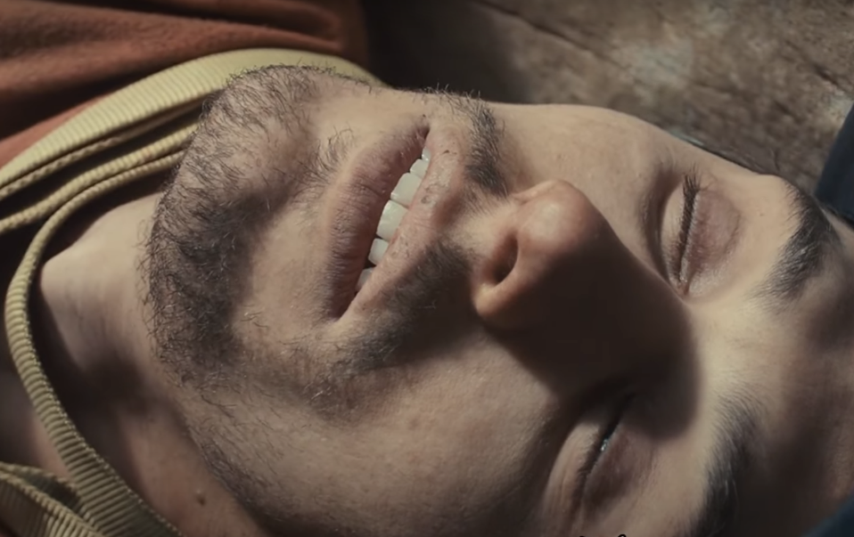 image of Aron Ralston with eyes shut