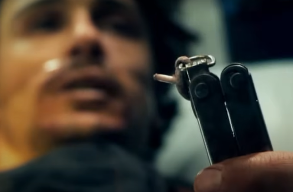 man holding pocket knife