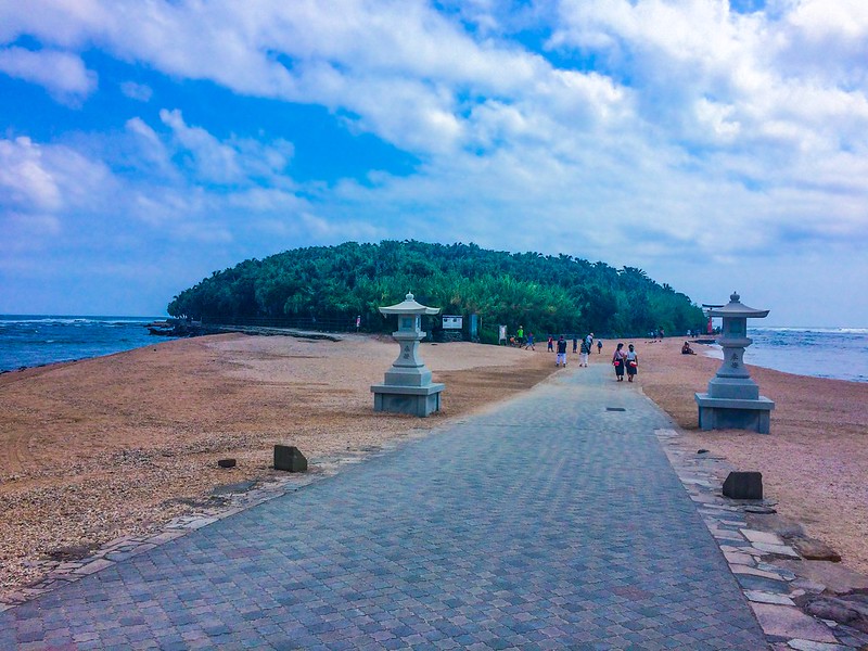 Landscape Photo of Aoshima also known as Cat Island with clody sky background