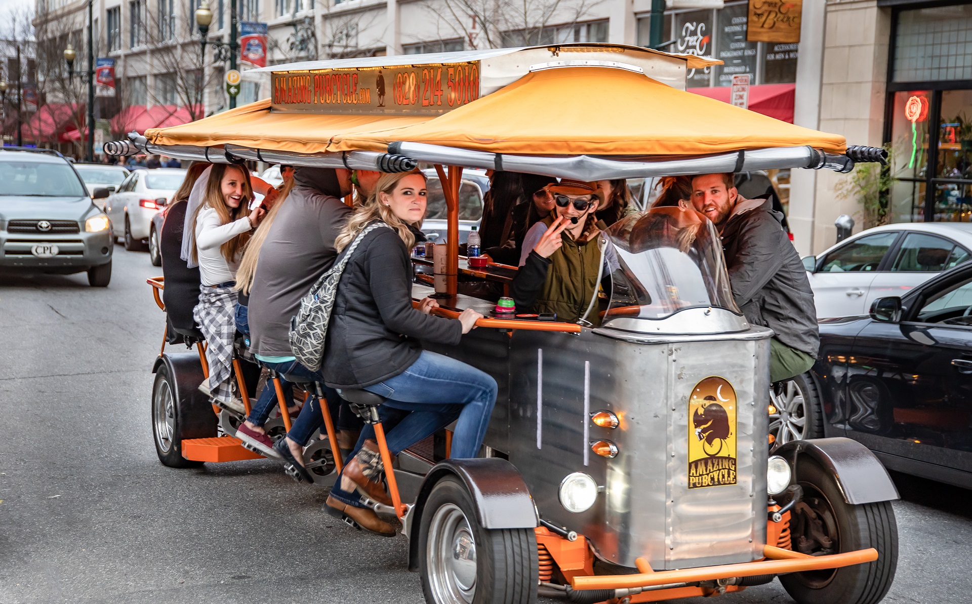 A 13 seater pedal-powered touring vehicle transports tourists - ASHEVILLE, NC