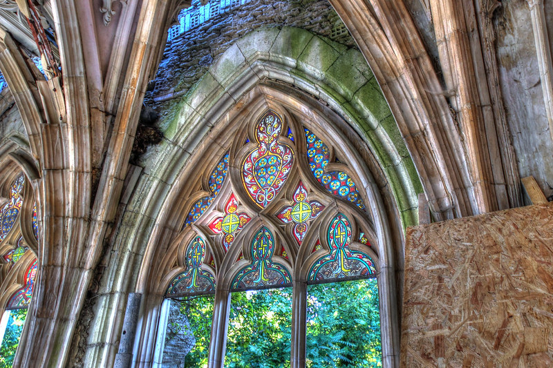 Photo of Abandoned Chapel interior covered with plants