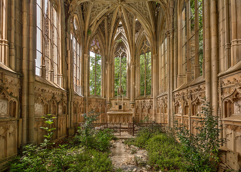 Photo of Abandoned Chapel covered with plants