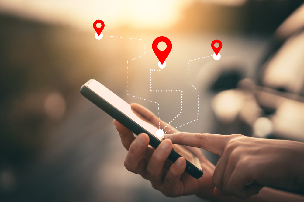 image of person using location services on phone