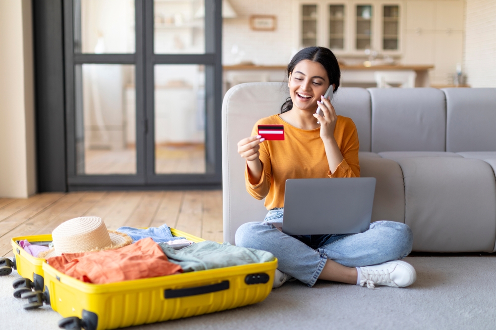 image of a happy woman on a laptop
