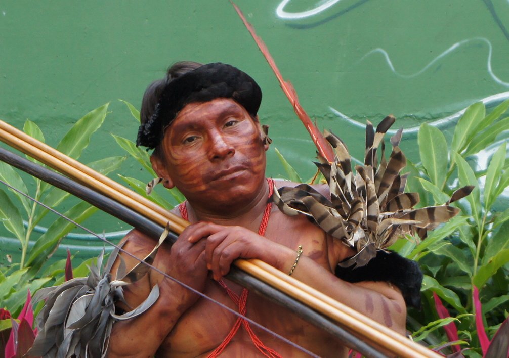 Portrait Photo of Yanomami man with traditional face paint