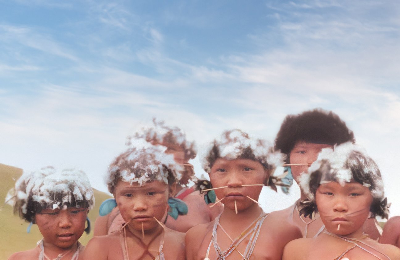 Portrait Photo of Yanomami children with traditional face decoration
