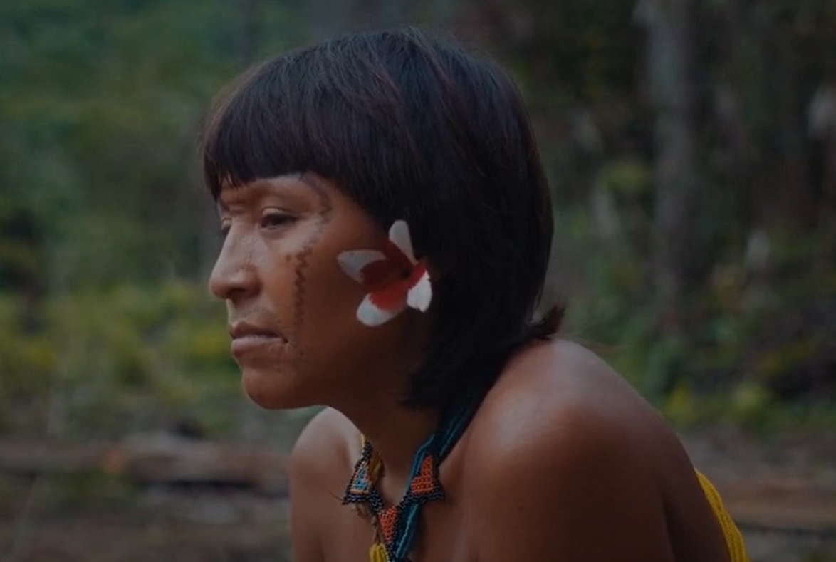 Profile Photo of Yanomami woman with traditional face paint smiling