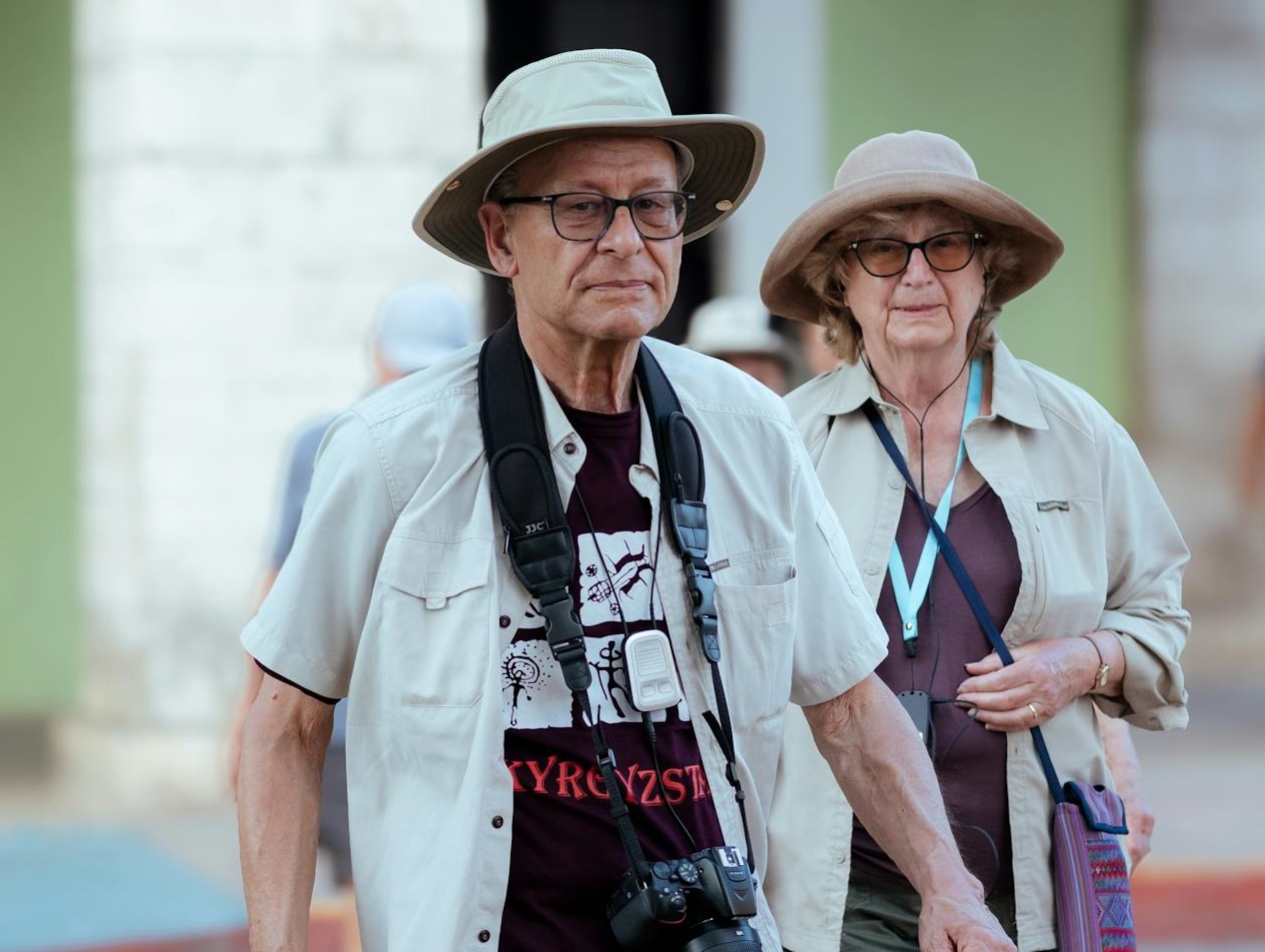Tourist Couple Crossing a Street