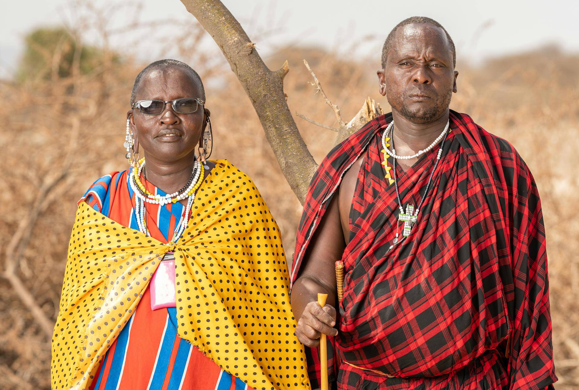 Man and woman from Maasai tribe in traditional clothes