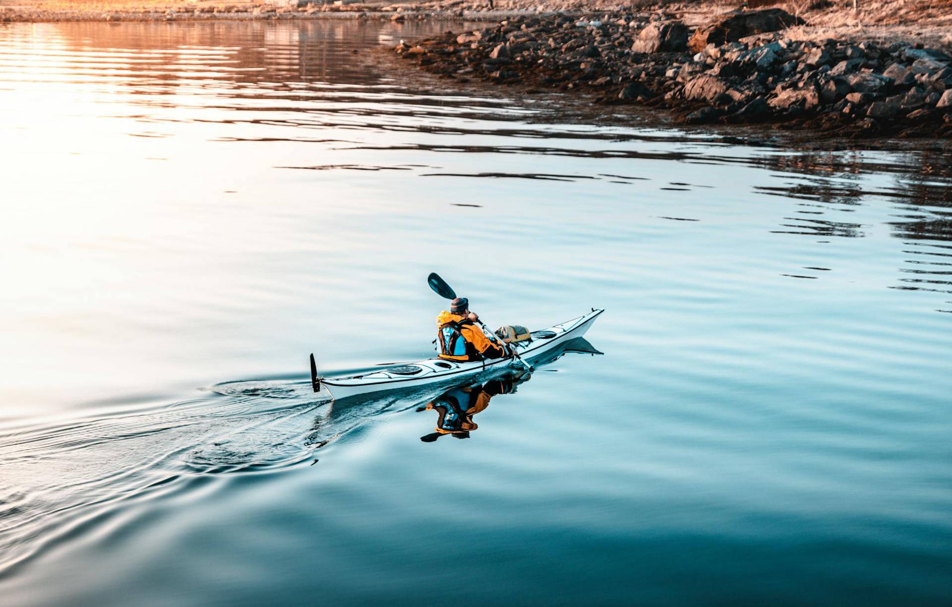 person riding on kayak