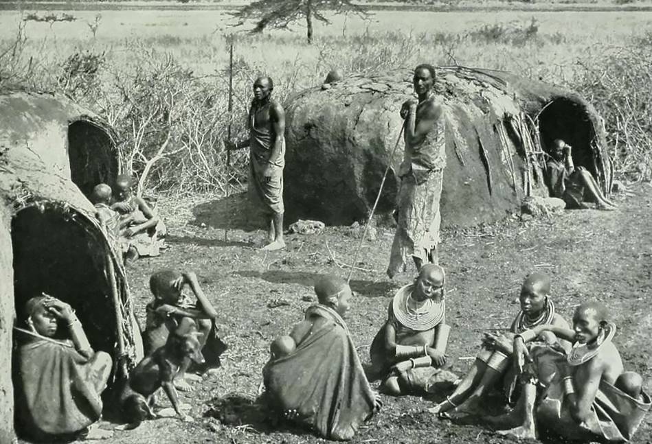 Maasai tribe in front of their hut