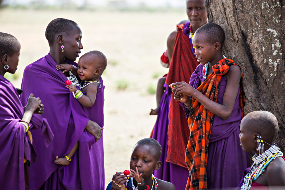 Young Maasai tribal women with kids