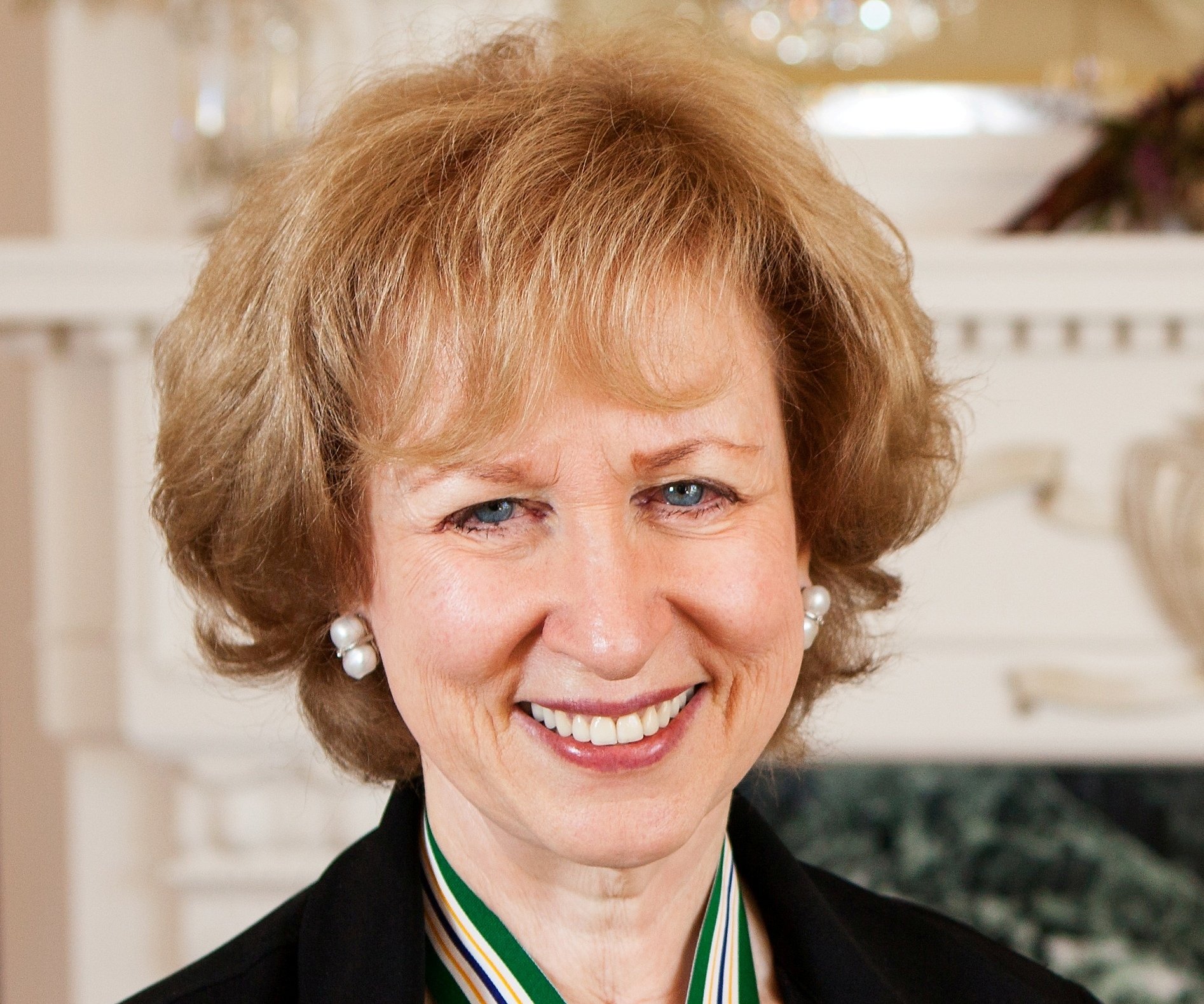 Portrait Photo of Kim Campbell in a black outfit