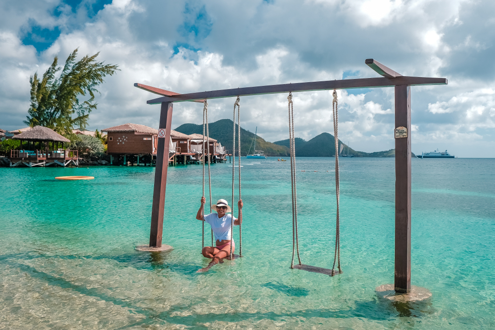 image of a woman in the water on the beach of Saint Lucia