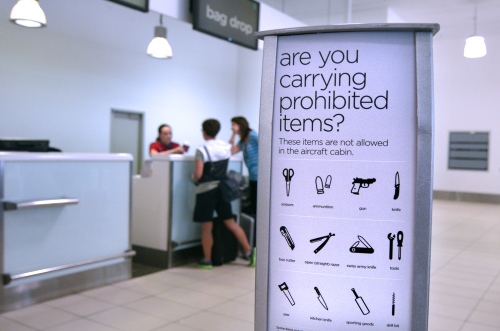 image of airport sign for prohibited items